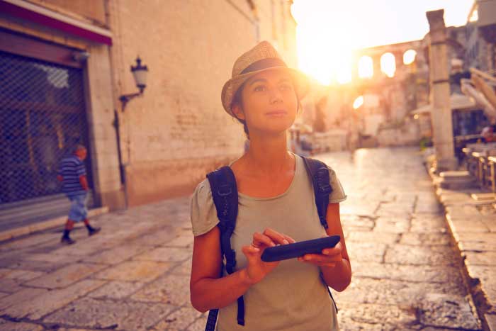 Girl travelling with her phone